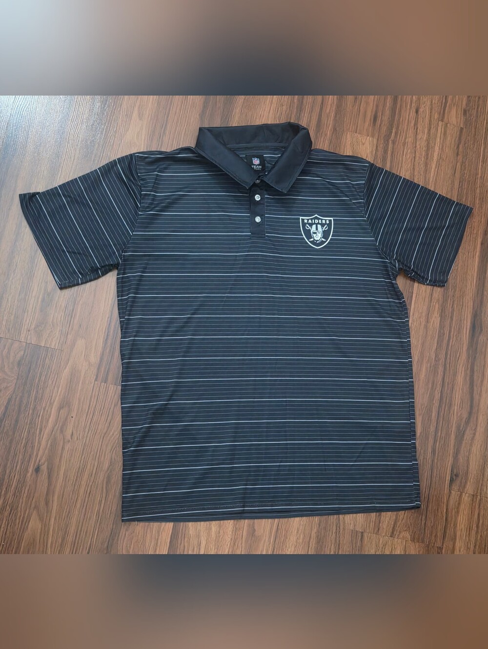 NFL Black Polo with Thin White Stripes and Raiders Shield